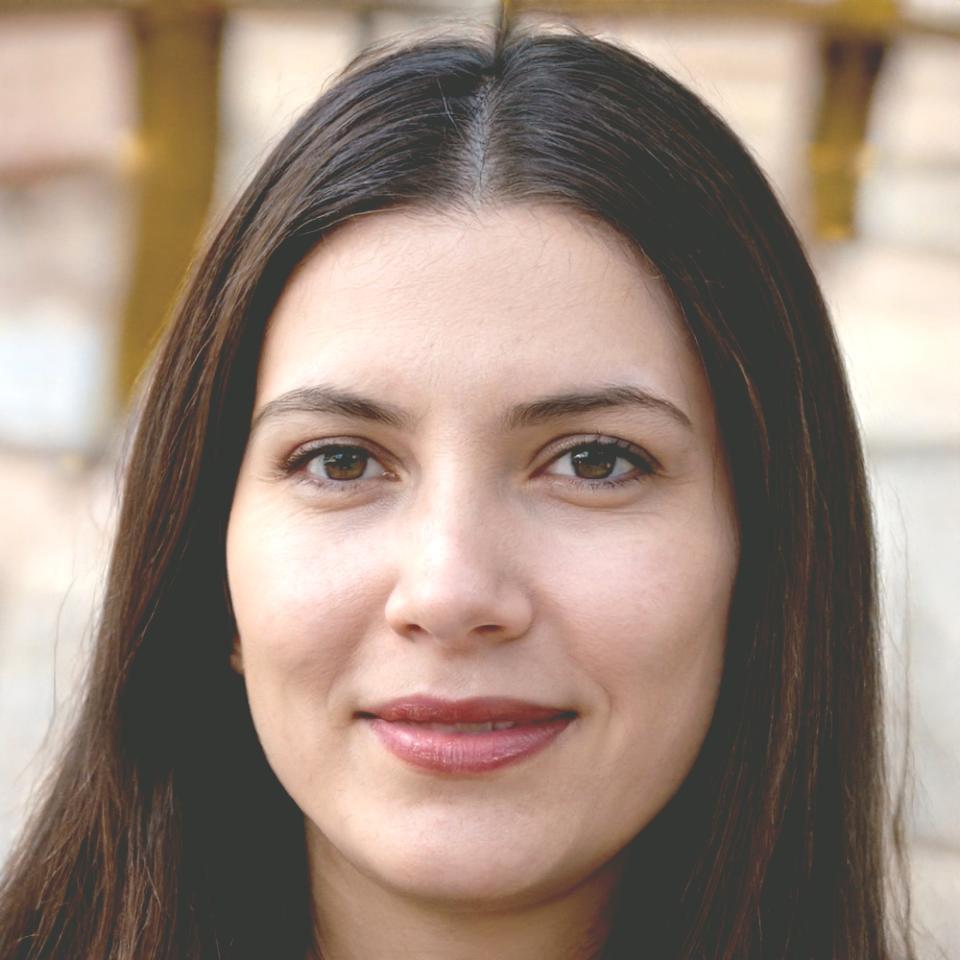 Professional headshot of Brenna Johansdottir, investment advisor