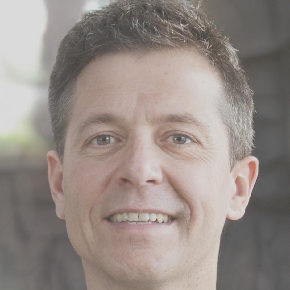 Professional headshot of Kieran Thorvaldsen, financial strategist